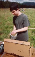 Derek making a pancake - Camporee 2001